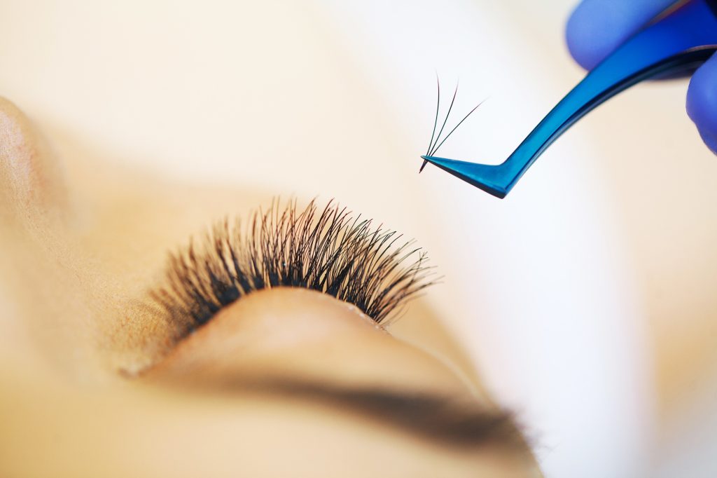 Inicio 3 Woman Eye with Long Eyelashes. Eyelash Extension