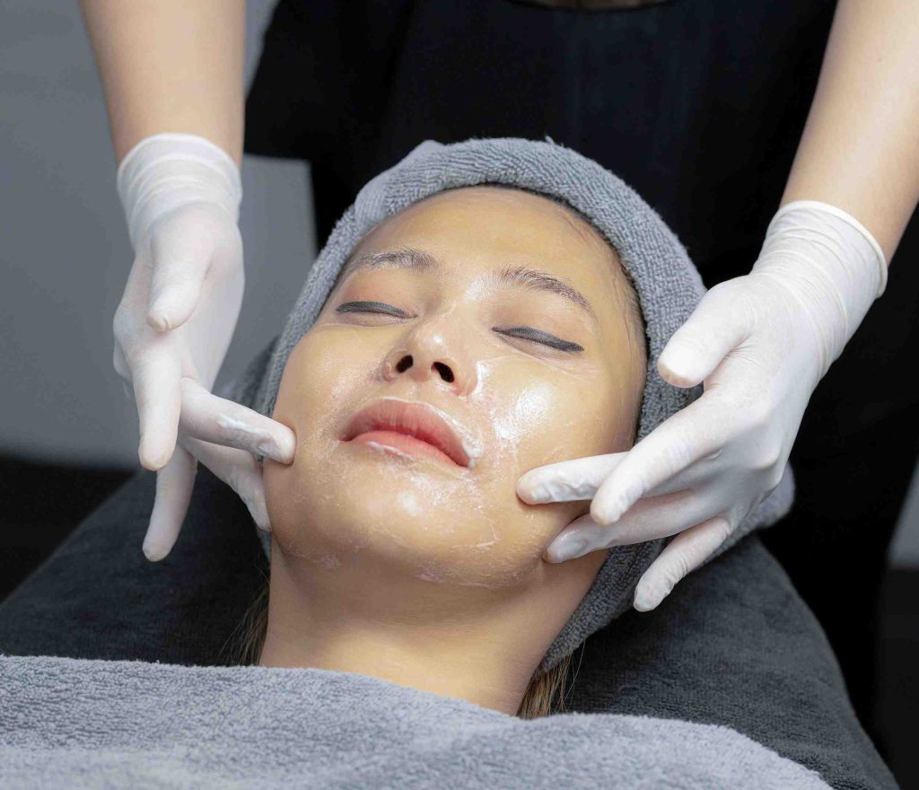 young woman doing facial massage in beauty clinic 2023 11 27 05 20 35 utc 11zon